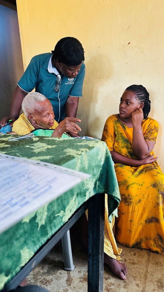 A counsellor listens as an older woman describes difficulty attending her faith community.